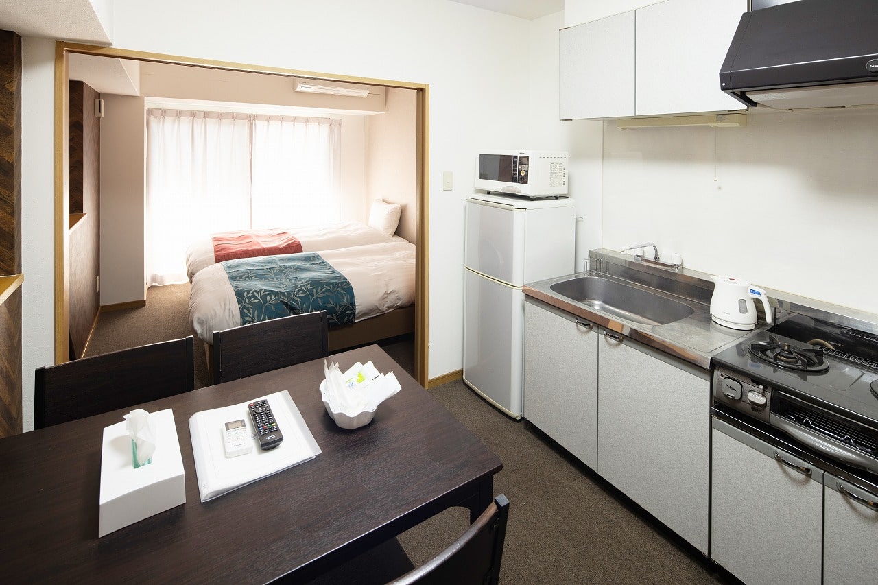 Coruscant Hotel長崎駅１ツインルーム客室写真。シングルベッド２台・3名まで宿泊可能。